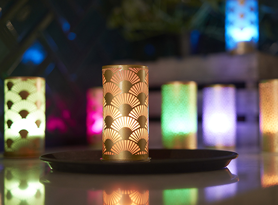 Wide range of LED candles on a restaurant table